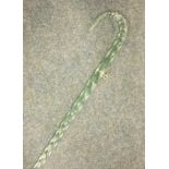 A green glass twisted walking stick. Est. £15 - £2