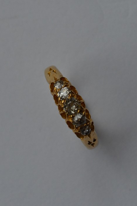 A Victorian diamond five stone ring in claw mount.