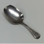 An Antique Russian silver caddy spoon decorated wi