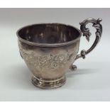 A French silver engraved cup with tapering body. A