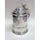 A good George II silver lidded tankard with taperi