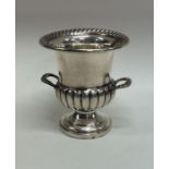 A small silver campana shaped vase. Approx. 53 gra