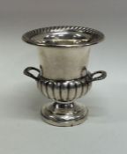 A small silver campana shaped vase. Approx. 53 gra