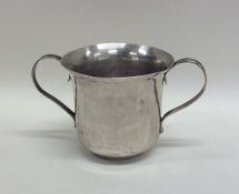 A Georgian silver two handled cup with reeded deco