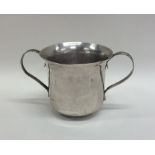 A Georgian silver two handled cup with reeded deco