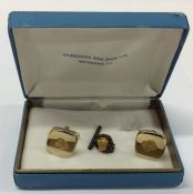 A pair of gold nugget mounted cufflinks together w