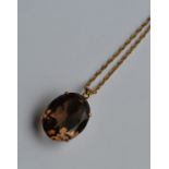 A 9 carat single stone pendant in claw mount on fi