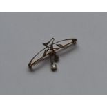 An attractive two colour gold brooch in the form o