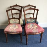 A set of four Victorian dining chairs with upholst