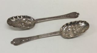 A pair of early silver dog nose spoons decorated w