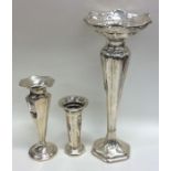 A group of three tapering silver spill vases. Appr