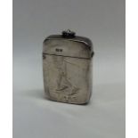 A Victorian silver hinged top vesta case decorated