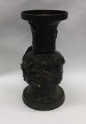 A large Chinese bronze vase attractively decorated