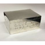 A large silver hinged top cigarette box of rectang