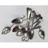 A collection of Georgian OE pattern silver teaspoo