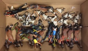 A box containing old soldiers, merry-go-ride toys