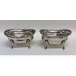 A heavy pair of Continental silver butter dishes w