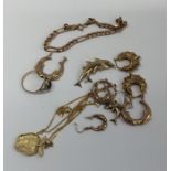 A collection of gold earrings, bracelets, pendants