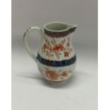 A Worcester sparrow beak jug with floral decoratio