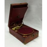 An old travelling 'HMV' record player. Est. £20 -