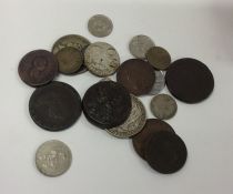 A box containing silver and other coinage. Est. £2