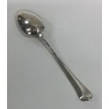A crested silver bottom marked dessert spoon. Appr