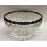 A good cut glass silver mounted fruit bowl of flut