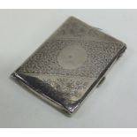 An attractive engraved silver purse with fitted in