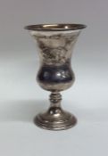 An Edwardian silver spirit tot on pedestal foot. B