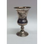 An Edwardian silver spirit tot on pedestal foot. B