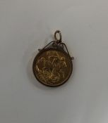 A 1911 full sovereign mounted as a pendant with lo