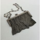 A silver mesh purse with chain link suspension. Ap