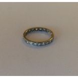 A good diamond full eternity ring in white gold mo