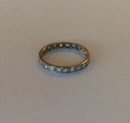 A good diamond full eternity ring in white gold mo