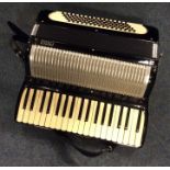 A cased 'Frisco' accordion in case. Est. £40 - £60