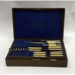 An oak cased canteen of cutlery. Est. £20 - £30.