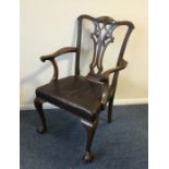 A Georgian style carver chair on ball and claw fee