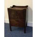 A Georgian mahogany commode with hinged front. Est