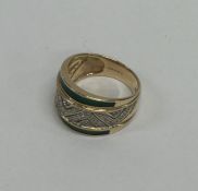 A 9 carat enamel and diamond ring. Approx. 6 grams