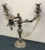 A Victorian Old Sheffield plated candelabrum embos