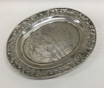 A Chinese silver oval pen tray with pierced decora
