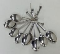 A set of ten silver nail top teaspoons. Sheffield.