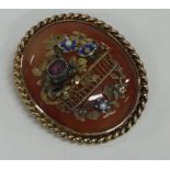 An attractive Antique oval agate brooch decorated