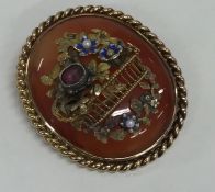 An attractive Antique oval agate brooch decorated