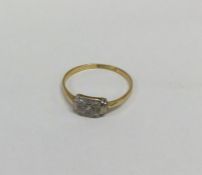An Art Deco diamond ring mounted in gold and plati