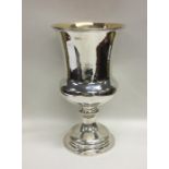 A massive Victorian silver goblet with gilt interi