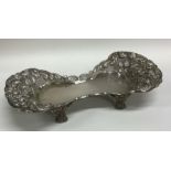 A Portuguese silver snuffer tray profusely decorat