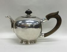 EXETER: A rare cast silver bullet shaped teapot wi