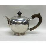 EXETER: A rare cast silver bullet shaped teapot wi