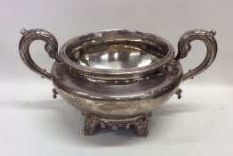 A heavy Georgian silver two handled sugar bowl wit